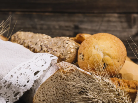 ear-wheat-with-baked-bread-wooden-table